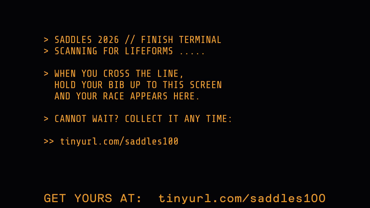 The console's attract screen: hold your bib up to the screen when you cross the line, or collect your card any time at the printed URL